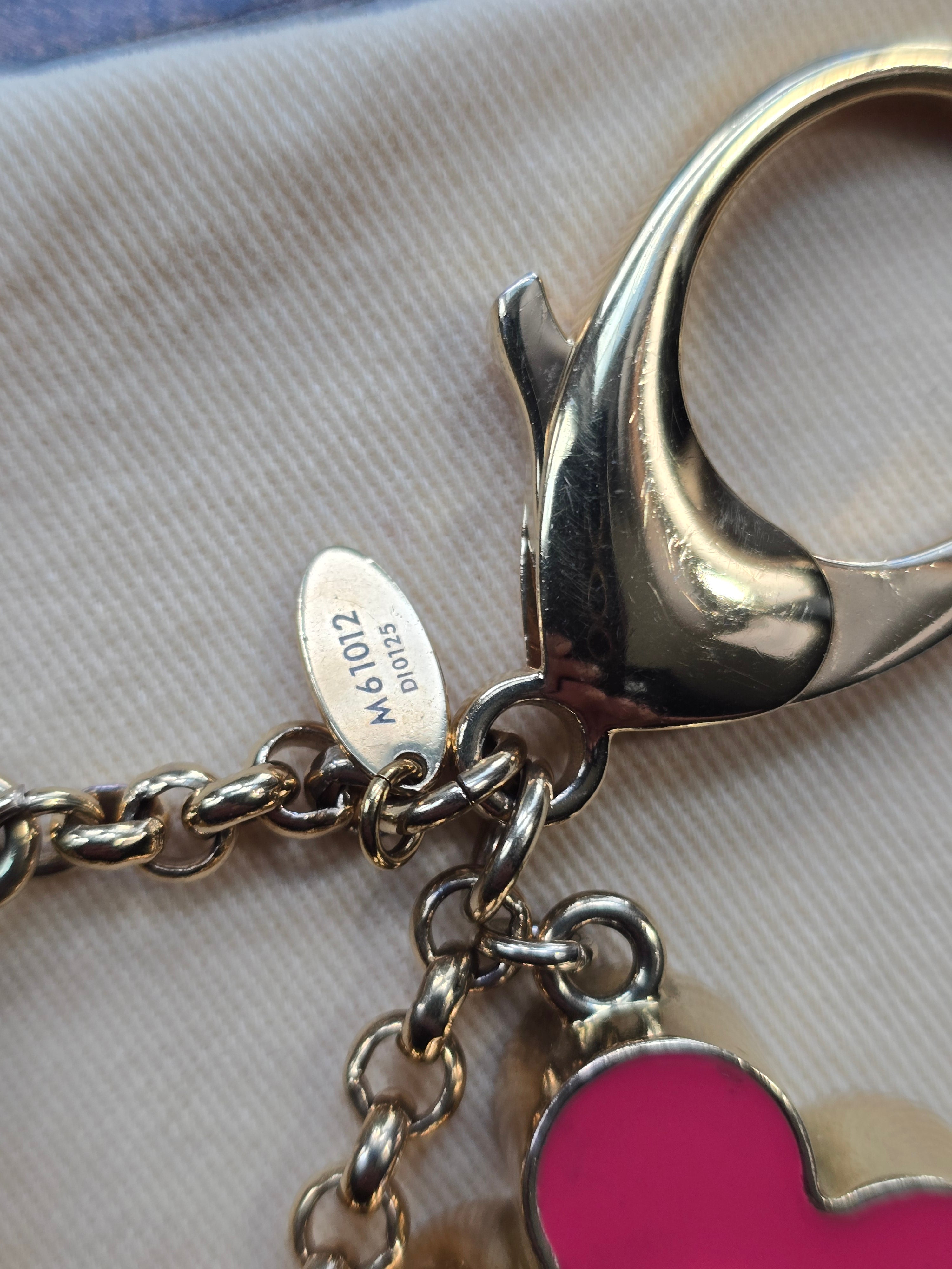 Authentic Louis Vuitton Fleur de Monogram Bag Charm