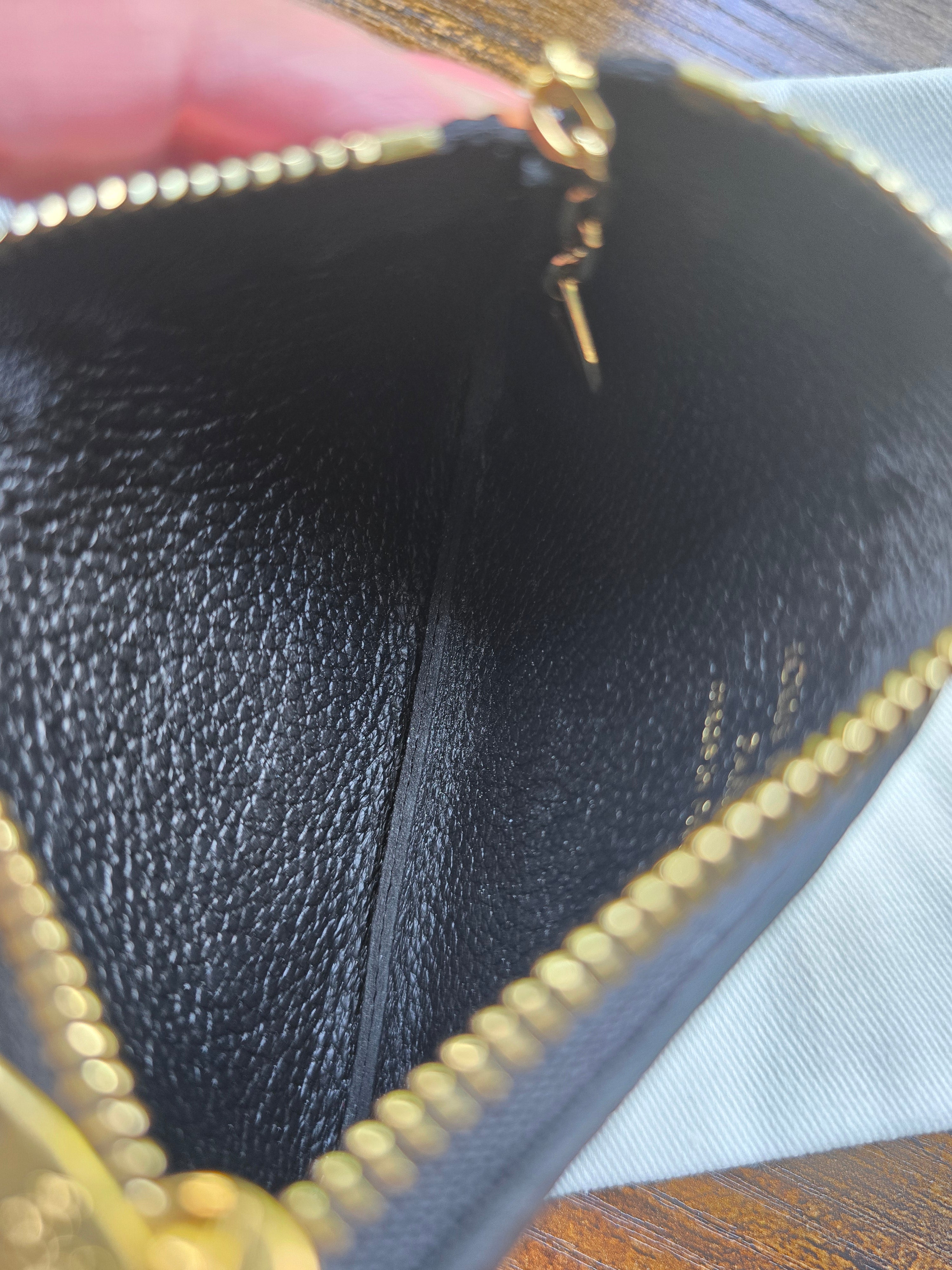 Authentic Louis Vuitton Monogram Empreinte Leather Key Pouch- Full Inclusion