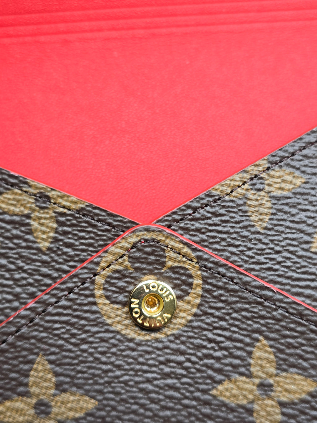 Authentic Louis Vuitton Monogram Kirigami Pochette- Medium
