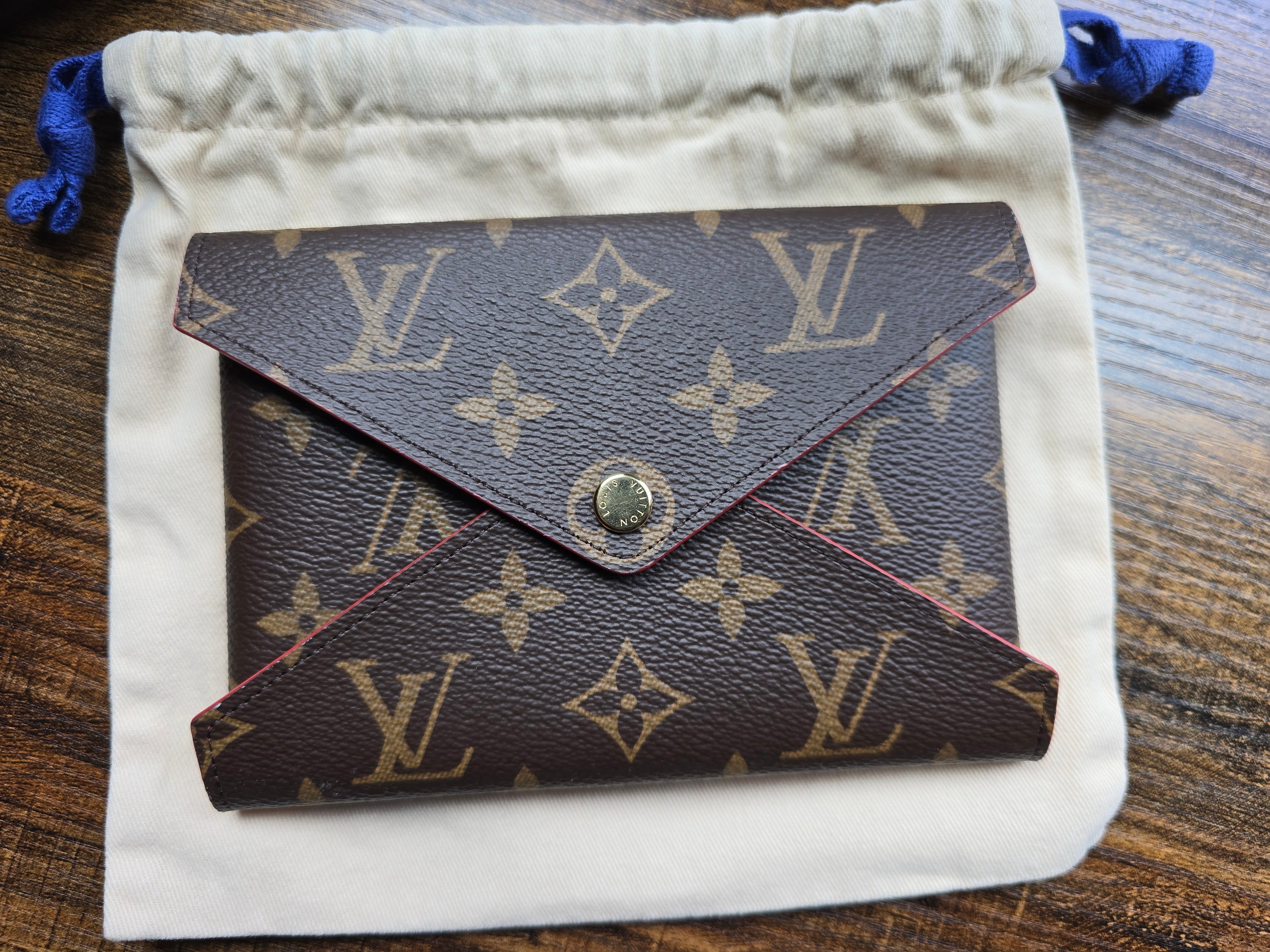 Authentic Louis Vuitton Monogram Kirigami Pochette- Medium