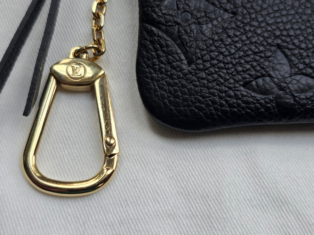 Authentic Louis Vuitton Monogram Empreinte Leather Key Pouch- Full Inclusion
