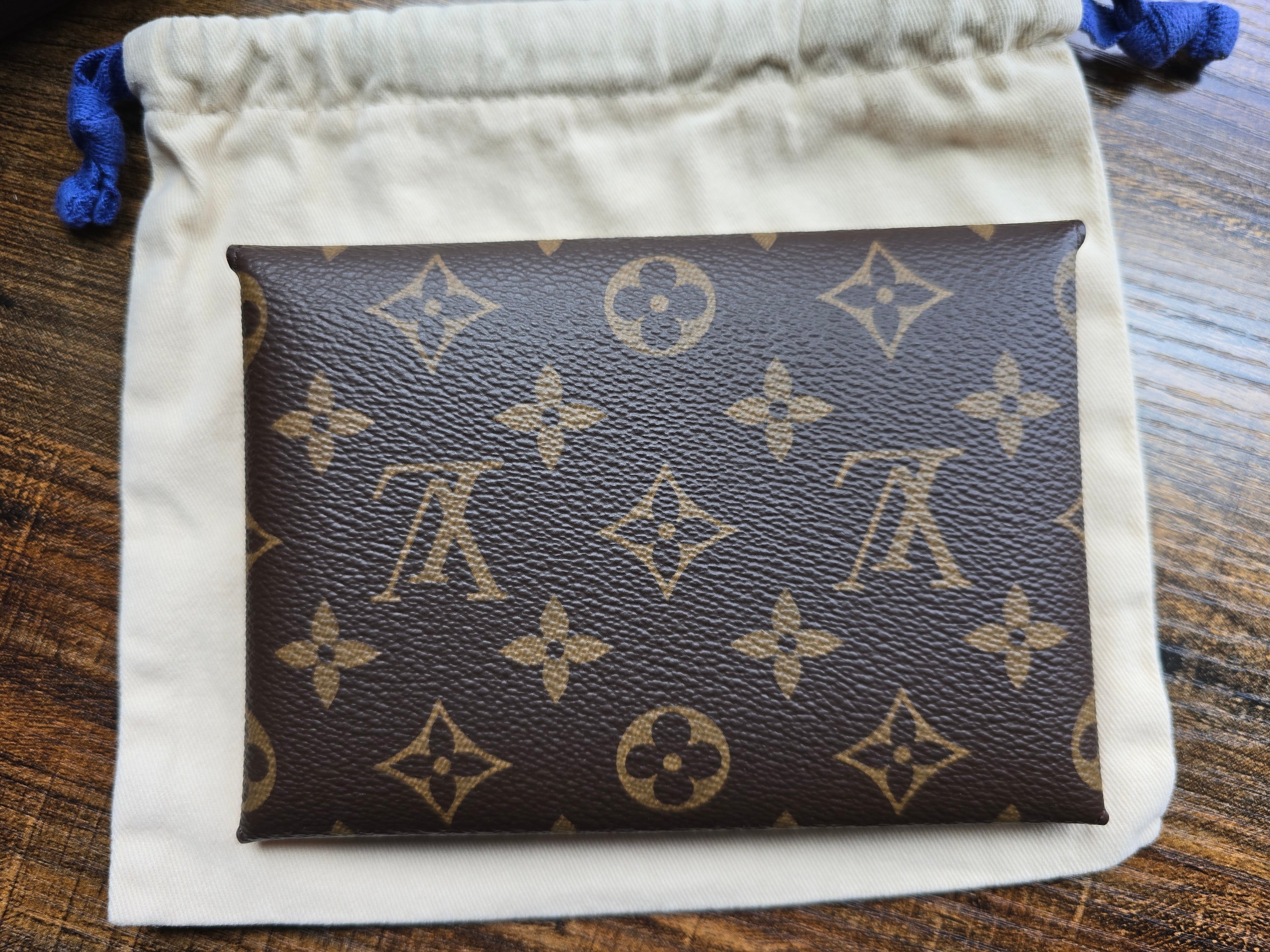 Authentic Louis Vuitton Monogram Kirigami Pochette- Medium