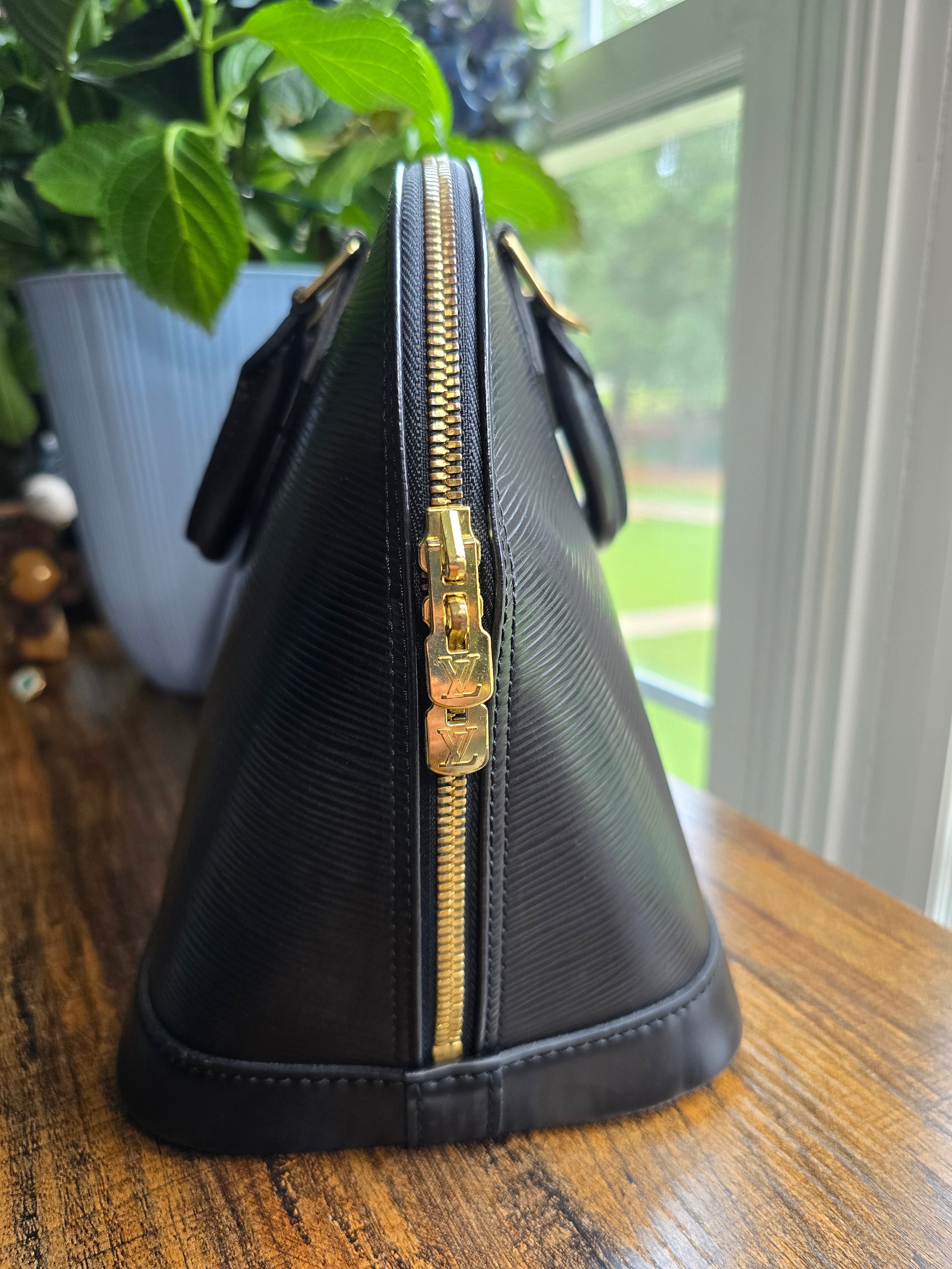 Authentic Louis Vuitton Black Epi Leather Alma PM (2008)