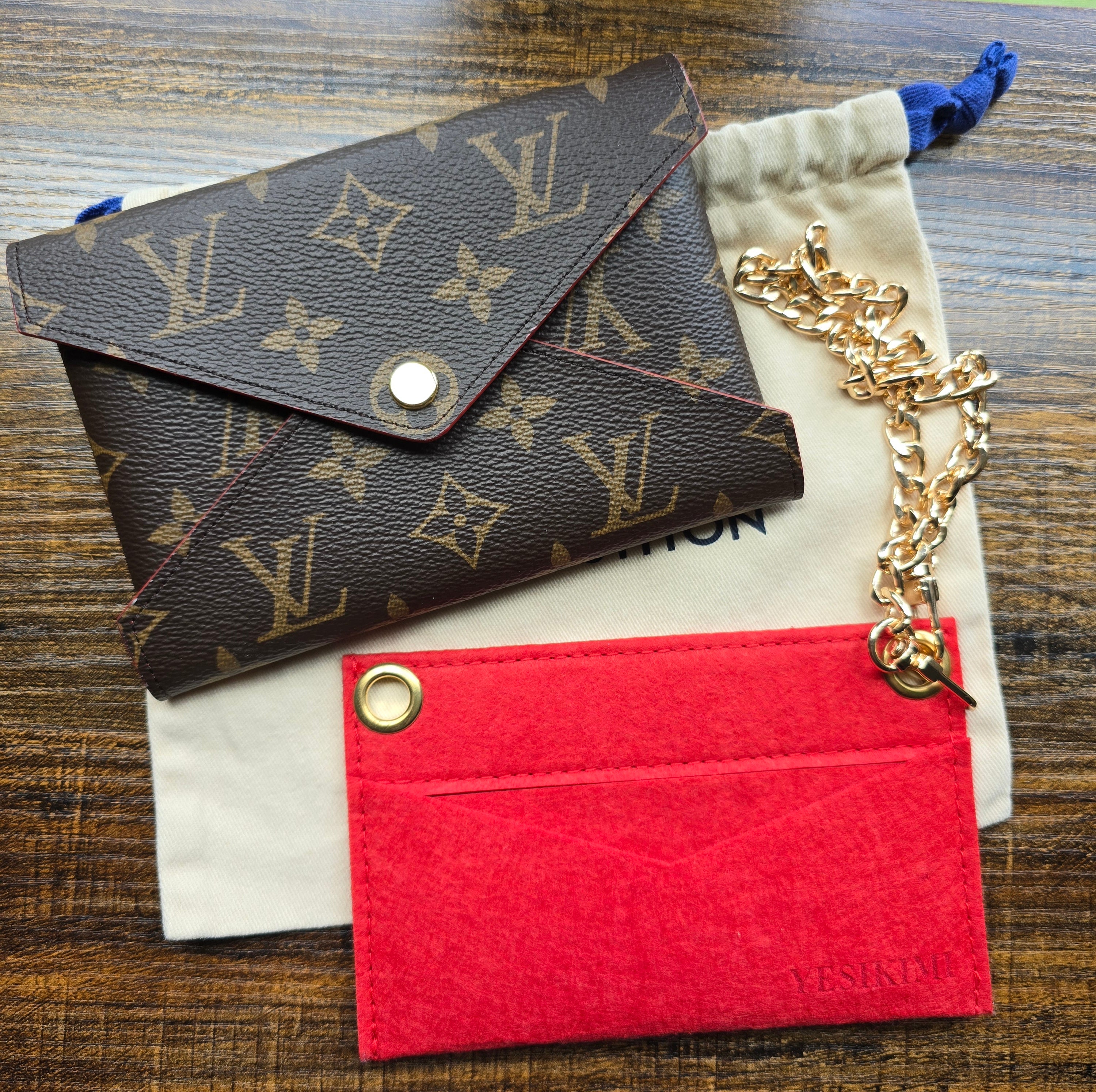 Authentic Louis Vuitton Monogram Kirigami Pochette- Medium