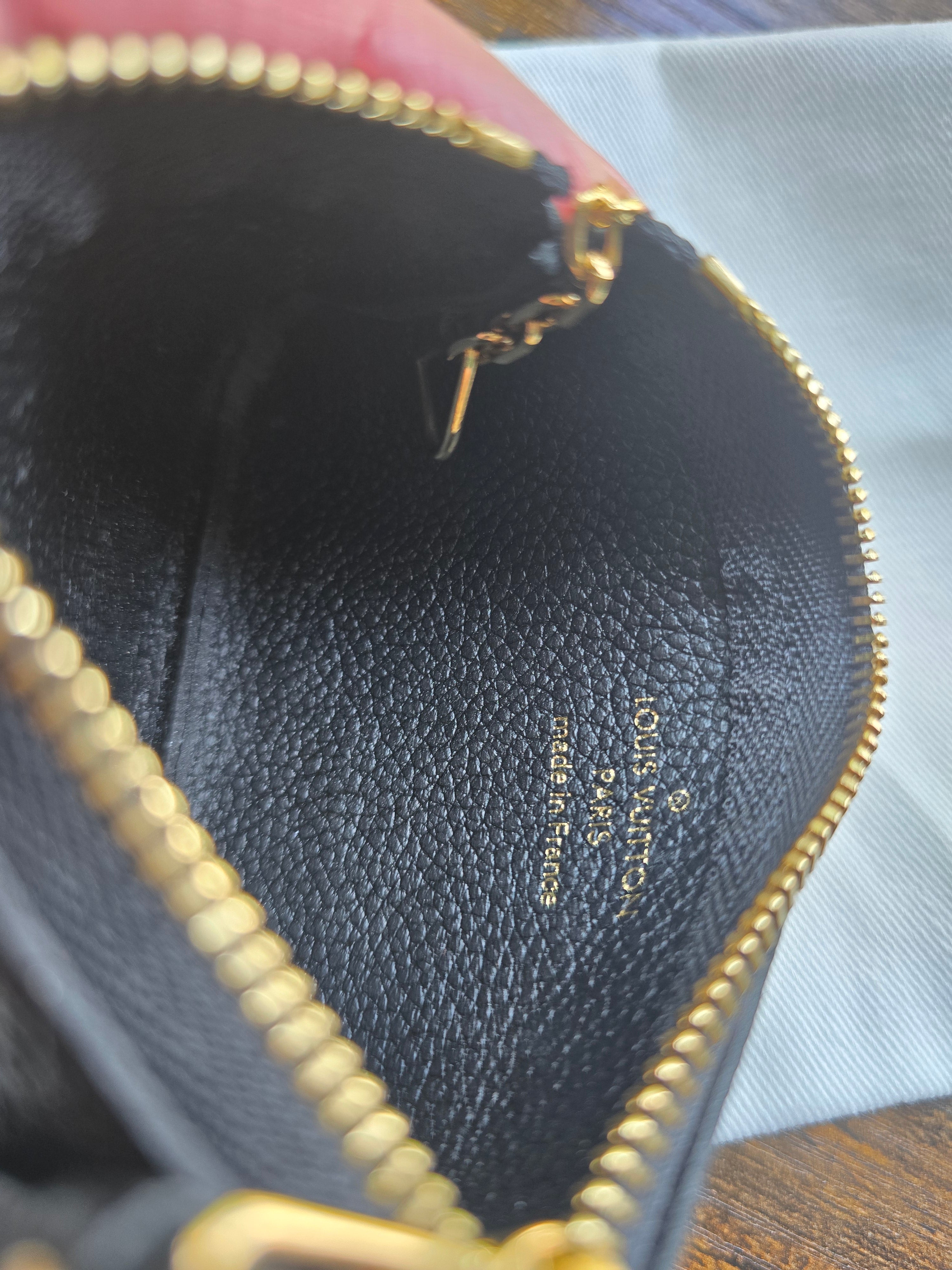 Authentic Louis Vuitton Monogram Empreinte Leather Key Pouch- Full Inclusion